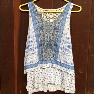 Blue and white sleeveless patterned tunic
